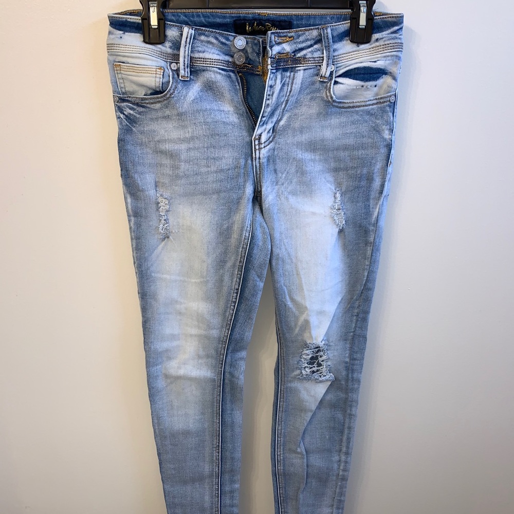 Distressed light wash jeans